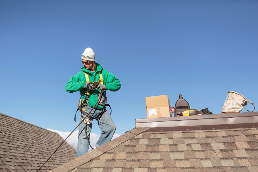 Roofer on the job